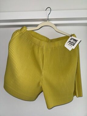 Homme Plissé Issey Miyake Pleated High-Waist Shorts in Mustard Yellow